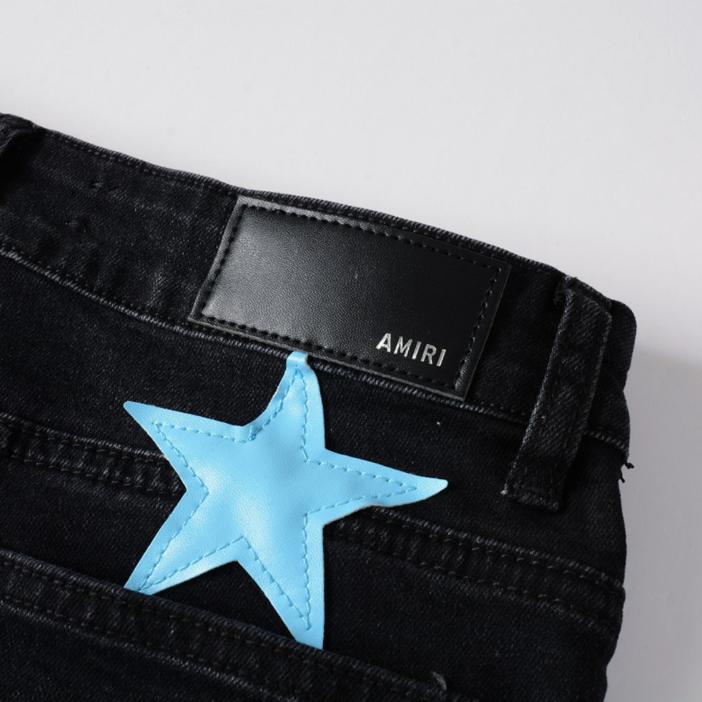 Amiri Slim Fit Designer Jeans für Herren mit Blauen Sternen Patches