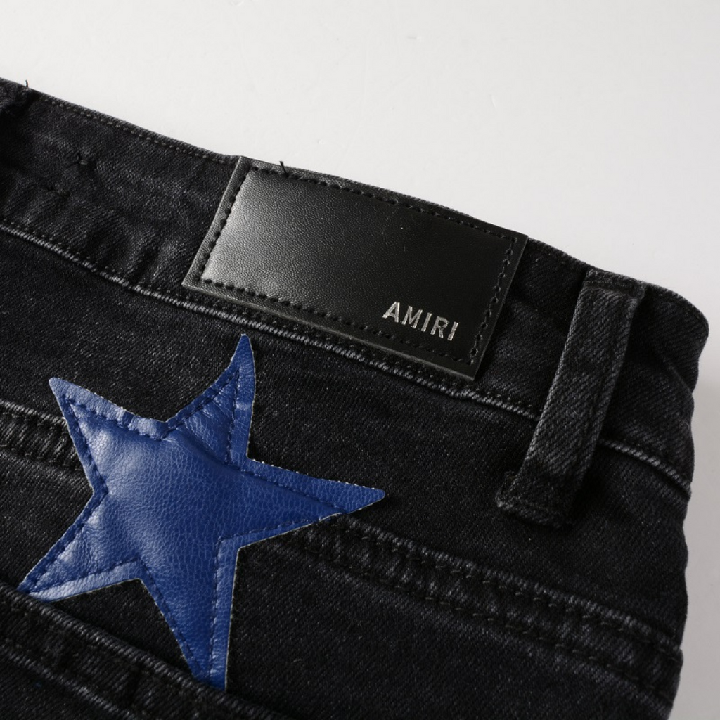 Amiri Marineblaue Sternen-Patch Jeans: Designer Denim mit Stretch Slim Fit