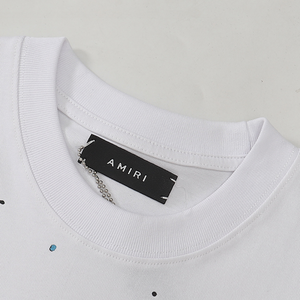 Amiri Paint Splatter T-Shirt: Luxuriöses Designer Streetwear Oberteil mit Kunstvollem Farbspritzer-Muster