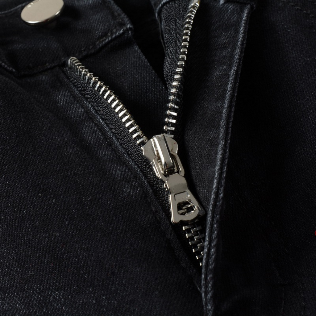 Amiri Rote Sternen-Patch Jeans: Luxuriöse Designer-Denim für Rock'n'Roll-Stil