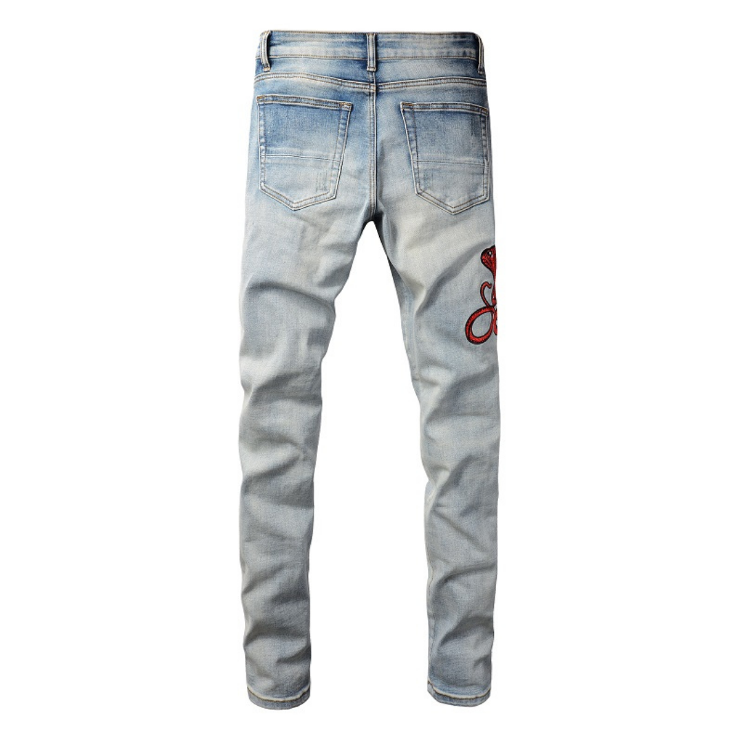 Amiri Fire Snake Jeans: Luxuriöse Designer-Denim mit feuriger Schlangenstickerei
