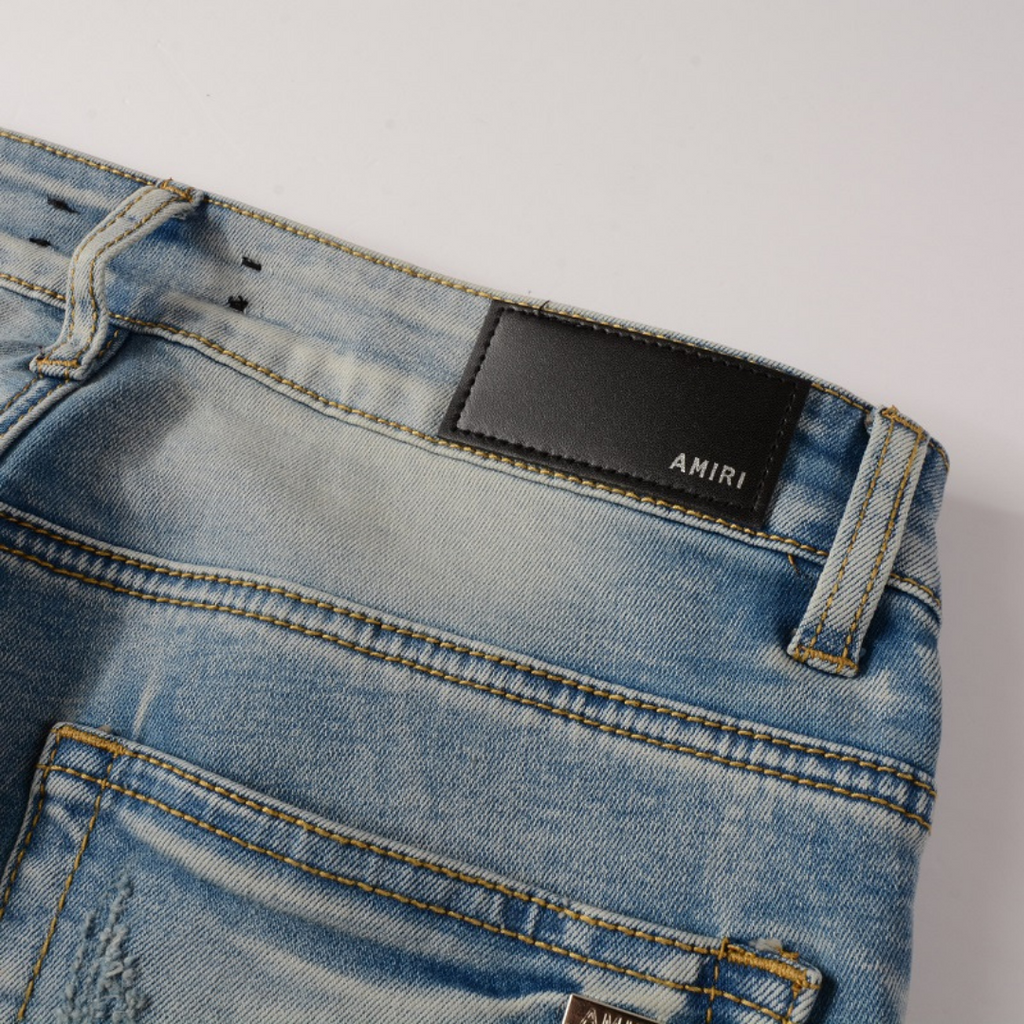 Amiri Herren Luxus Schwarze Patch Jeans – Designer Denim mit Destroyed Look
