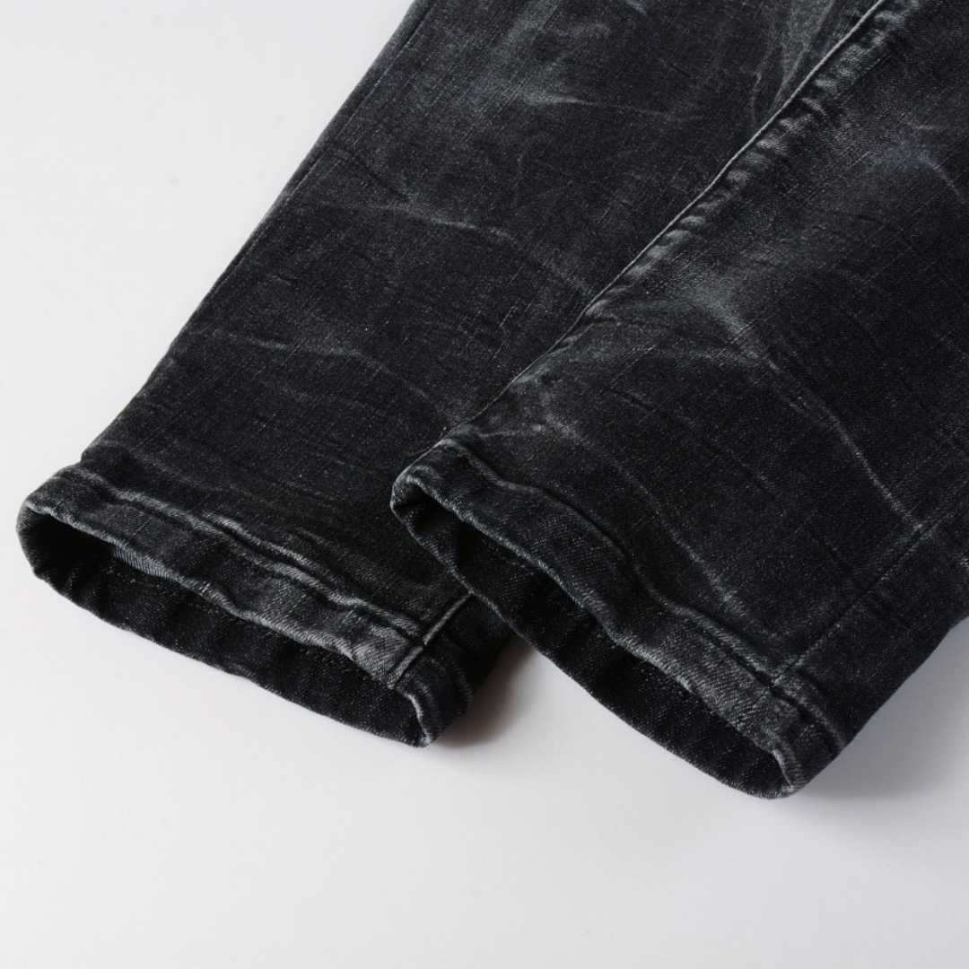 Amiri Luxus Herren Slim Fit Jeans mit auffälligen blauen Patches