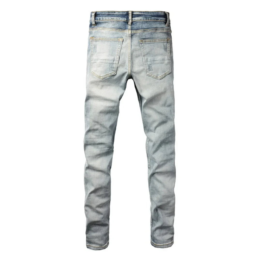Amiri Blaue Patch Jeans Luxus Designer Denim Slim Fit Destroyed Look
