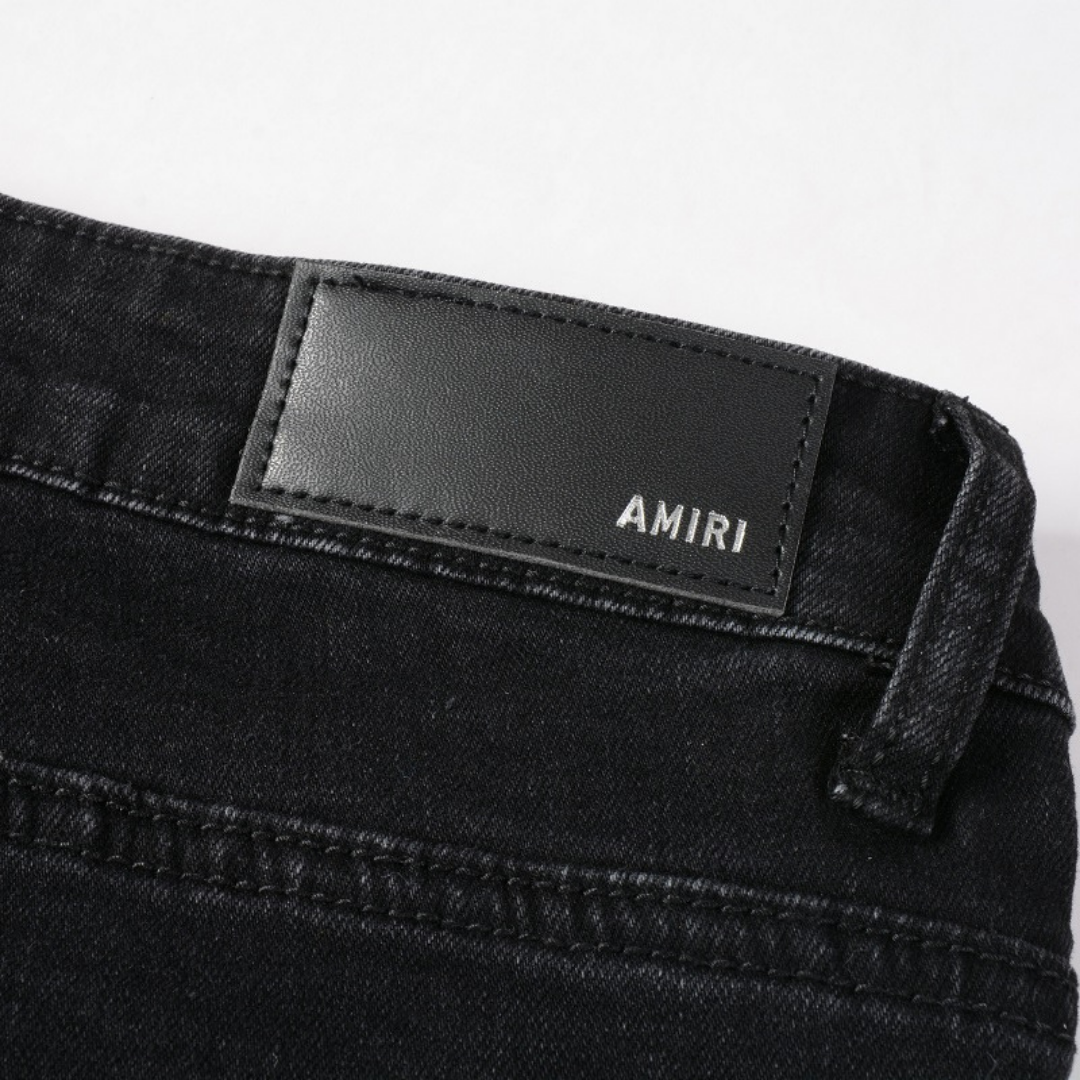 Amiri Camouflage Patch Jeans: Luxuriöse Designer Denim im Rock'n'Roll Stil
