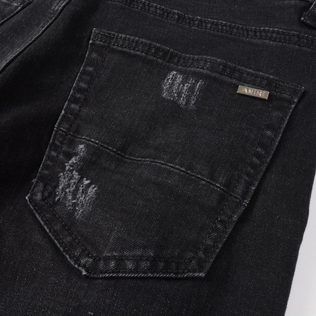 Amiri Camouflage Patch Jeans: Luxuriöse Designer Denim im Rock'n'Roll Stil