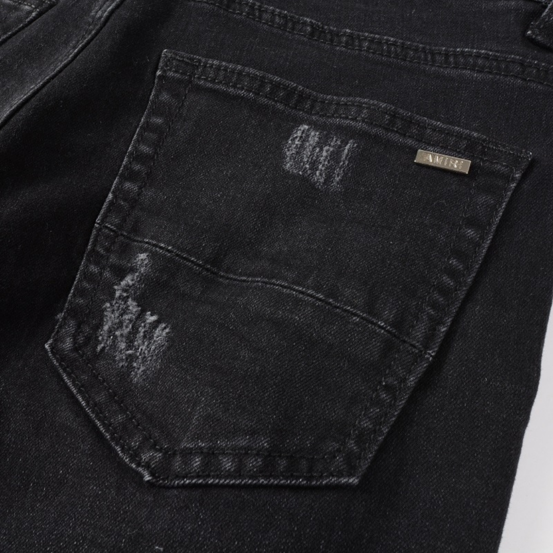 Amiri Camouflage Patch Jeans: Luxuriöse Designer Denim im Rock'n'Roll Stil