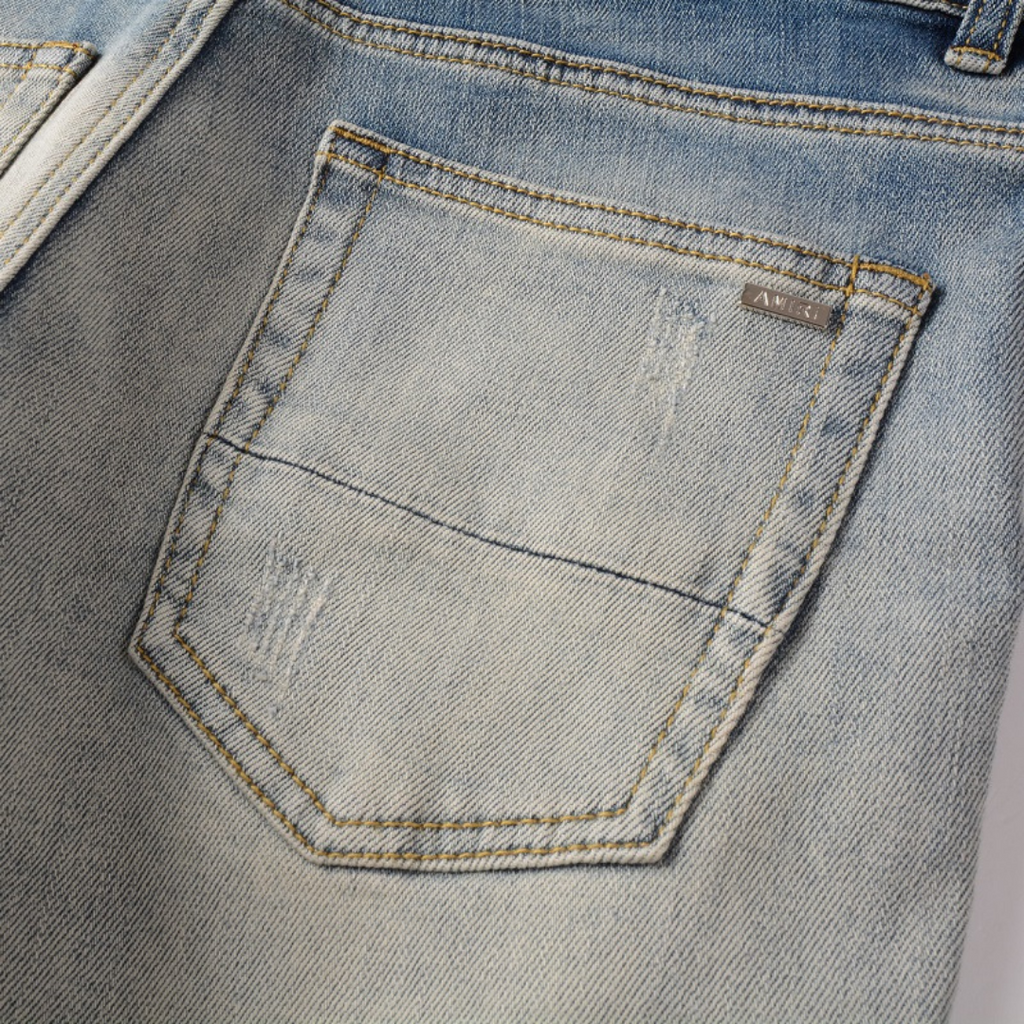 Amiri Designer Patch Distressed Jeans für Herren – Stylische Ripped Denim Hose
