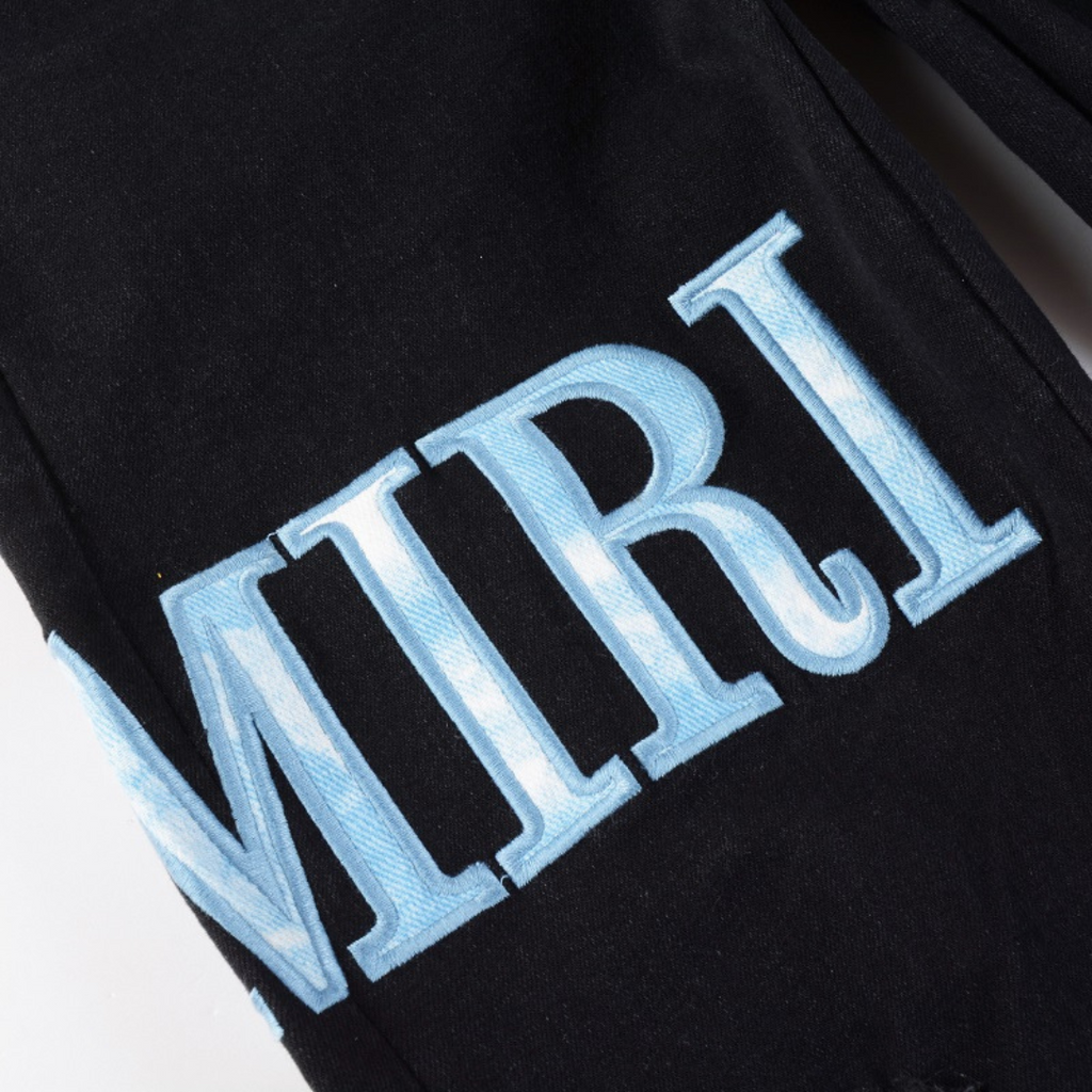 Amiri Herren Blaue Patch Jeans: Luxuriöse Denim Streetwear mit Stil