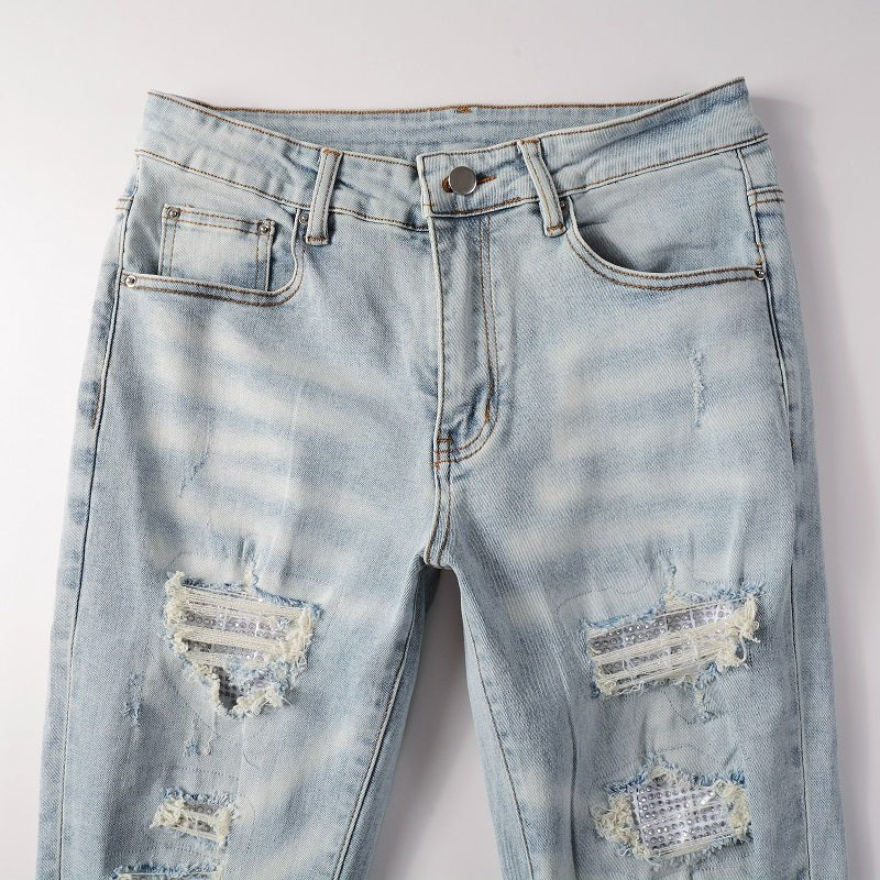 Amiri Hellblaue Patchwork Jeans für Herren – Distressed Luxus Slim Fit Denim