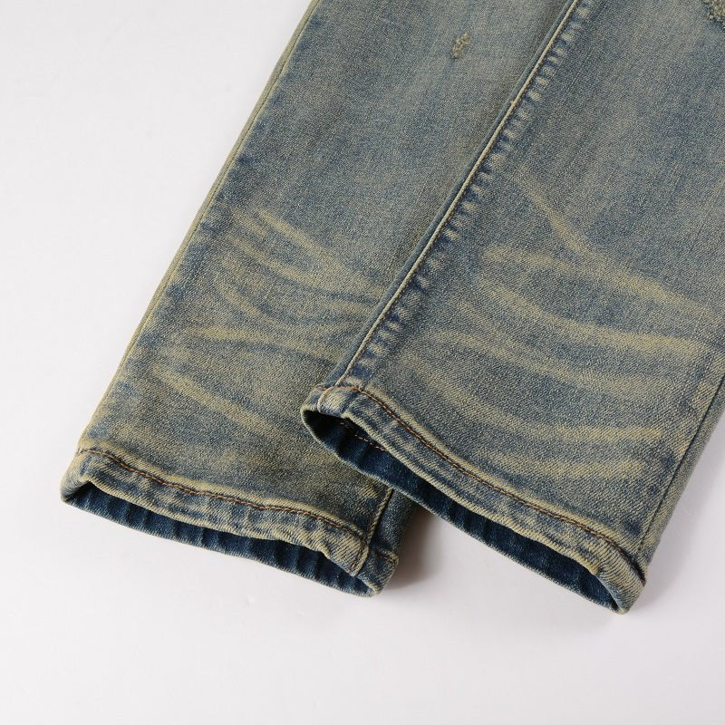 Amiri Patch-Effekt Blue Jeans: Luxuriöse Designer Denim mit Rock'n'Roll Flair