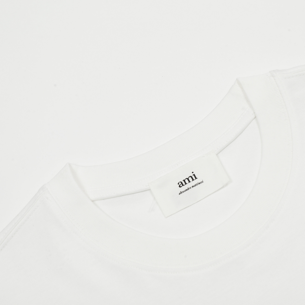 AMI Paris Unisex T-Shirt aus Baumwolle mit Herzlogo – Luxuriöses Designer Basic