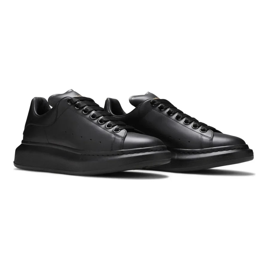 Alexander McQueen Schwarzer Leder Sneaker: Luxus, Komfort & Ikonischer Stil