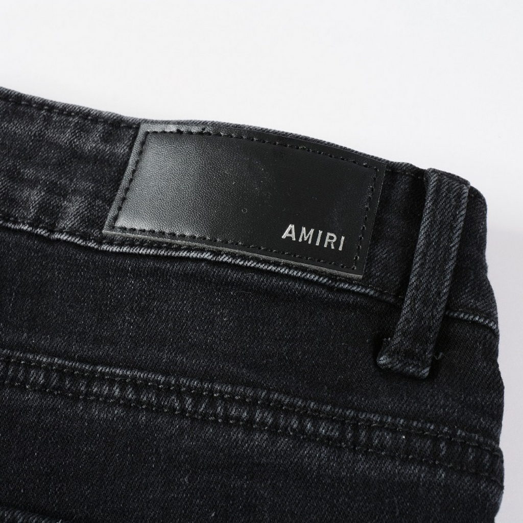 Amiri Schwarze Ripped Jeans: Luxuriöser Streetstyle, Handgefertigt, Perfekte Passform