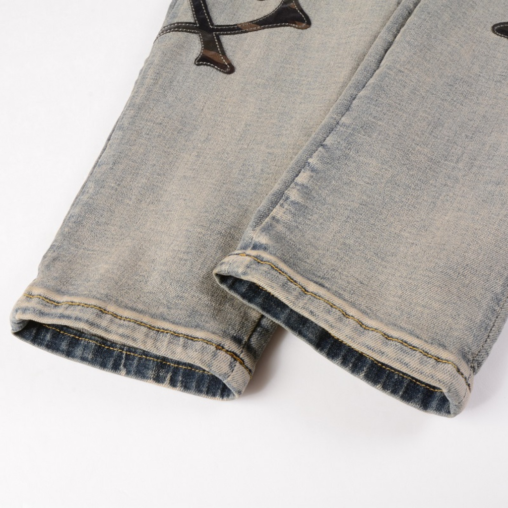 Amiri Schwarze Bones Blaue Jeans – Stylische Denim mit Knochen-Design