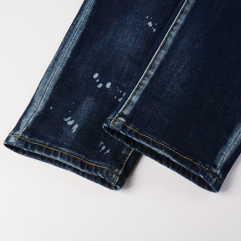 Amiri Paint Drip Blaue Herrenjeans – Luxuriöser Streetwear-Stil mit einzigartigem Design