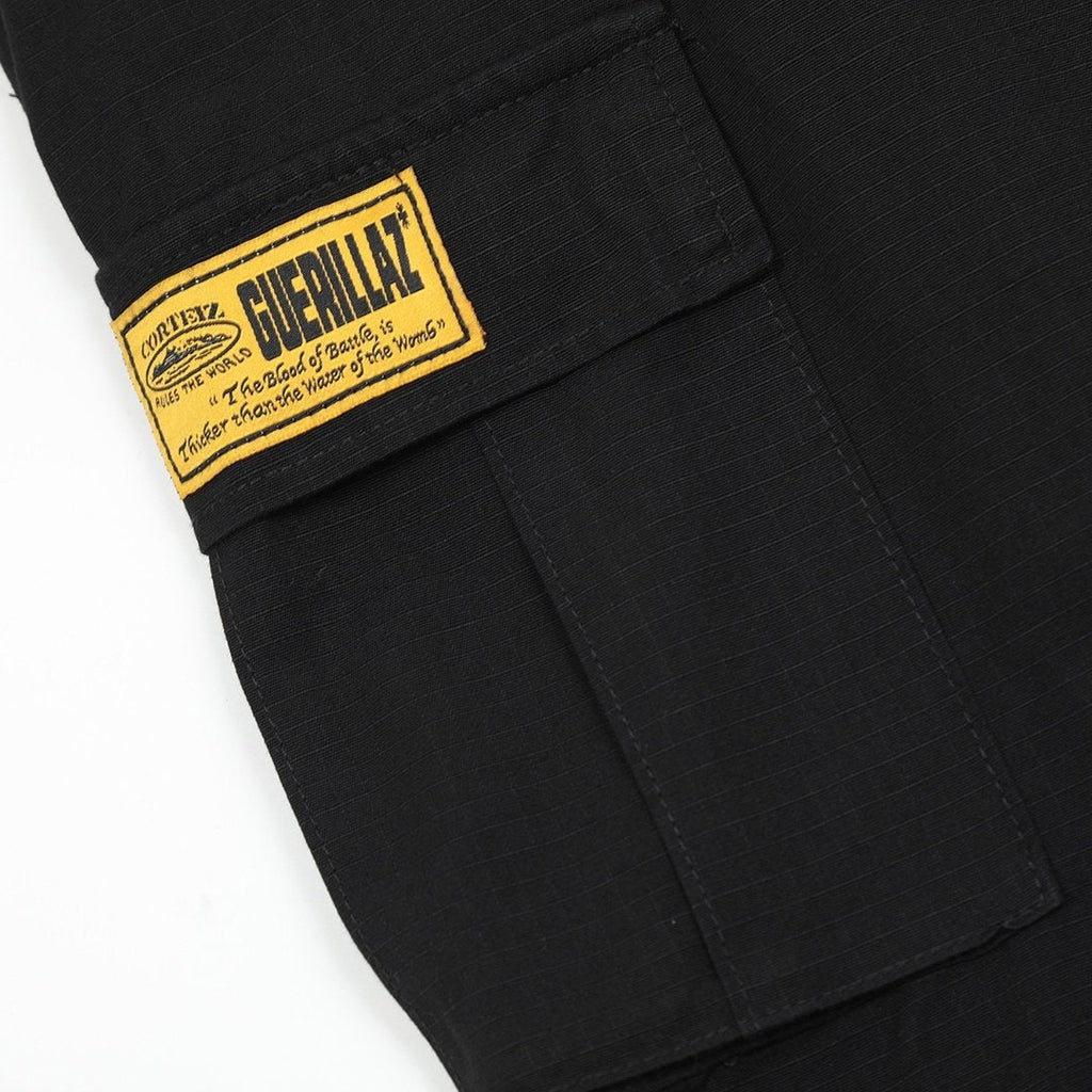 Corteiz Cargo Shorts Schwarz Gelb – Robuste Streetwear für den urbanen Look